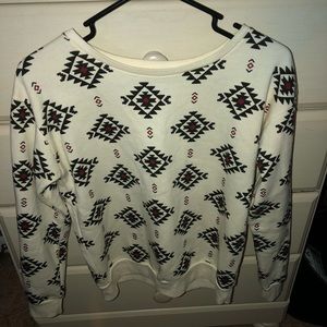 Cream, black, and maroon tribal print sweater